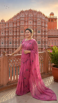 Rani Pink Bandhani Georgette Saree — draped at Hawa Mahal, Jaipur